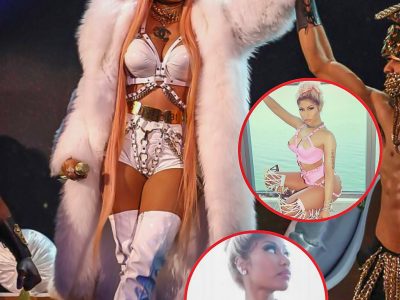 Nicki Minaj promotes her new song Rack It Up while dancing in pink PVC underwear and a harness.